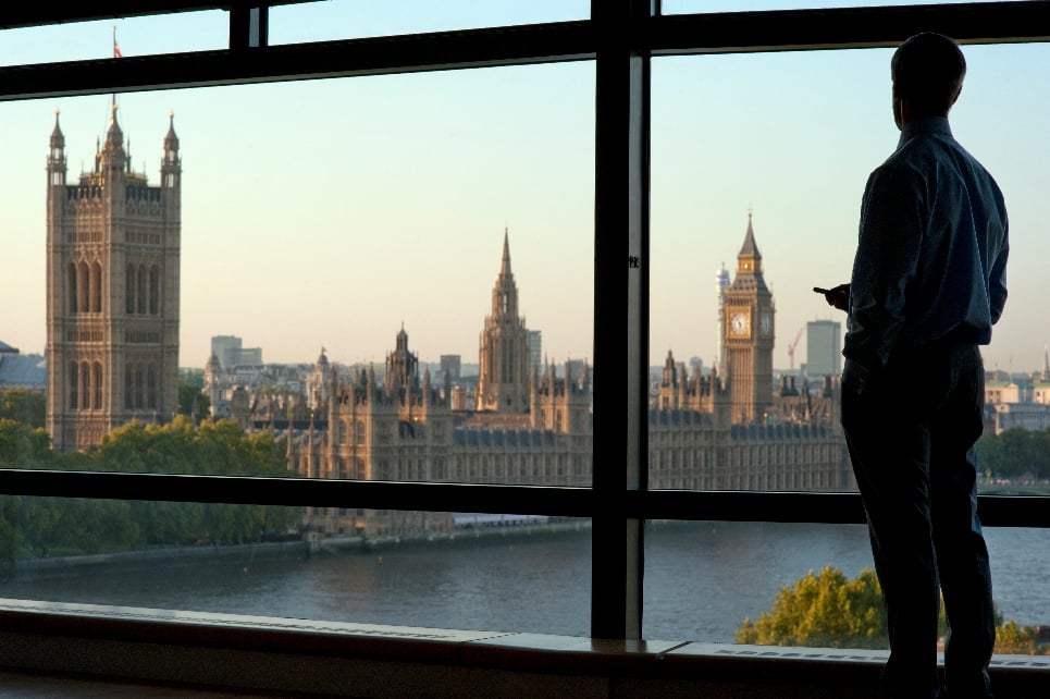 Business man overlooking London skyline